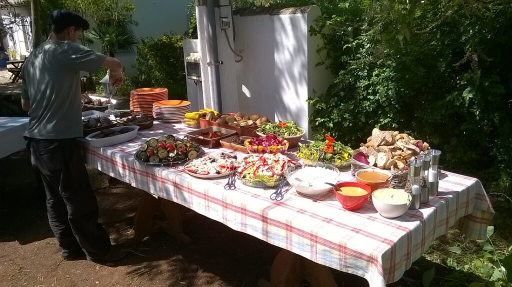 Photo of table laid with deliciosu looking mediterraean food